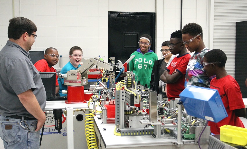 Children enrolled in one of last year’s Camp AMP sessions tour the mechatronics lab at East Mississippi Community College’s Golden Triangle campus. Many of the popular summer camps return this year, along with some new ones. 