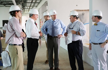 Appalachian Regional Commission (ARC) Federal Co-chair Tim Thomas, at center, was among officials who toured East Mississippi Community College’s Communiversity Tuesday morning. Here, he speaks with, from left, U.S. Sen. Cindy Hyde-Smith’s field representative Gregory Alston, EMCC Interim President Dr. Rick Young, ARC Mississippi State Program Director Mike Armour and U.S. Rep. Gregg Harper’s Deputy District Director Kyle Jordan. 