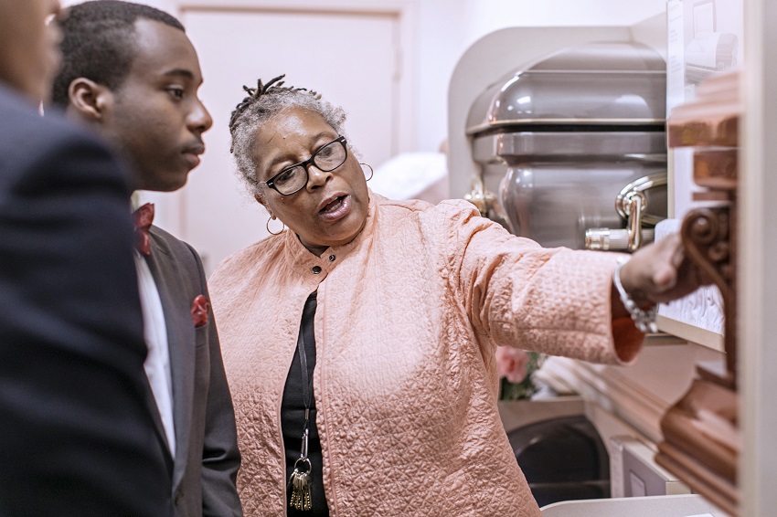 East Mississippi Community College Funeral Services Technology Director Octavia Dickerson, at right, speaks to student Leonard Williams, Jr., of Columbus, during a class in this photo taken last year.