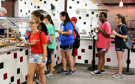 Children with the Ikthoos Camp eat in the cafeteria on East Mississippi Community College’s Scooba campus. This is the 14th consecutive year the Christian summer camp has been held at EMCC.