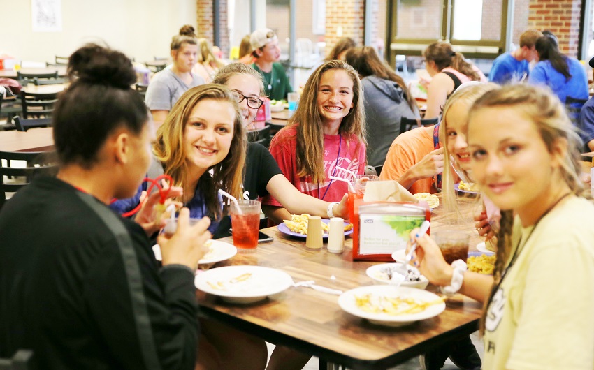 Children with the Ikthoos Camp eat in the cafeteria on East Mississippi Community College’s Scooba campus. This is the 14th consecutive year the Christian summer camp has been held at EMCC.