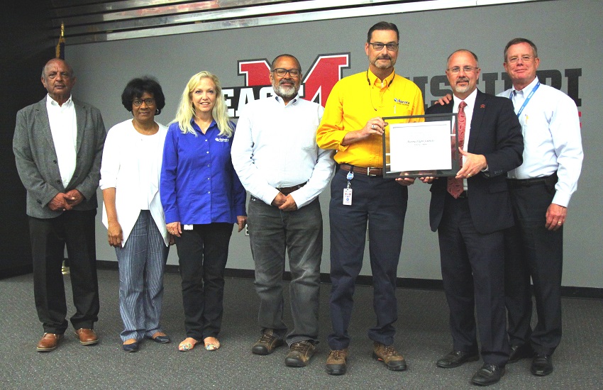 Aurora Flight Sciences received the Director’s Award at East Mississippi Community College’s 29th Annual Industry Appreciation Luncheon Wednesday, May 2, in the Lyceum Auditorium on the Golden Triangle campus. Here, EMCC President Dr. Thomas Huebner, second from right, presents the award.