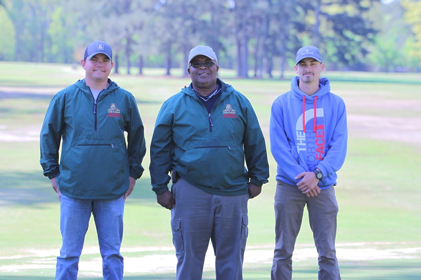 East Mississippi Community College students Zachary Mozingo, at left, and Matthew Morse, at far right, are headed to Montana this summer to intern at golf courses there. EMCC Turf Management instructor Danny Smith, center, said students in the program at Lion Hills are in high demand.