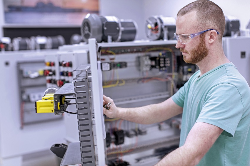 Former East Mississippi Community College student Dane Harrington works on a project in the Electrical Technology lab in this file photo. May is National Electrical Safety Month.