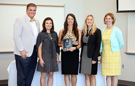 East Mississippi Community College mathematics instructor Alison Alexander, at center, was among the graduates of the Golden Triangle Leadership Program. A graduation ceremony was held June 5 at the college’s Communiversity.