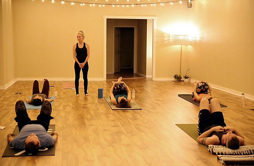 East Mississippi Community College is launching a new program that will offer low-cost noncredit classes to be taught at various locations throughout Columbus. Here, Cynthia Mutch teaches a class at Bliss Yoga Studio, which will be the site of one of the classes.