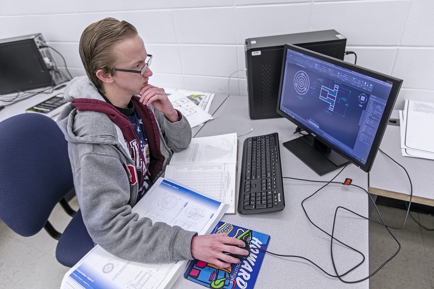 Brady Dempsey, who graduated from East Mississippi Community College in May, works on an Engineering Technology, Drafting & Design program project in this file photo. Registration is under way at EMCC for the summer and fall terms. 