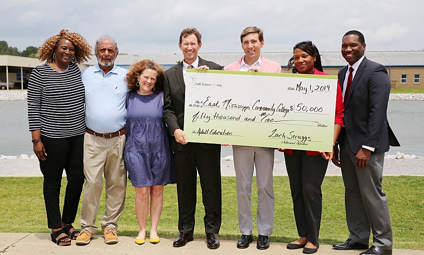 East Mississippi Community College’s received a $50,000 donation from 2nd Chance MS for the SOAR Program offered through the college’s Adult Education Launch Pad. Pictured at a ceremonial check presentation are, from left, EMCC Adult Education Launch Pad Assistant Director/Transition Specialist Mary Ann Latham, EMCC Vice President for Workforce and Community Services Dr. Raj Shaunak, 2nd Chance MS Director of Development Catti Beals, EMCC President Dr. Scott Alsobrooks, 2nd Chance MS Executive Director Zach Scruggs, EMCC Workforce Community Outreach Program Director Sha’Carla Petty, and EMCC Adult Education Launch Pad Director Dr. O’Neil Wright.