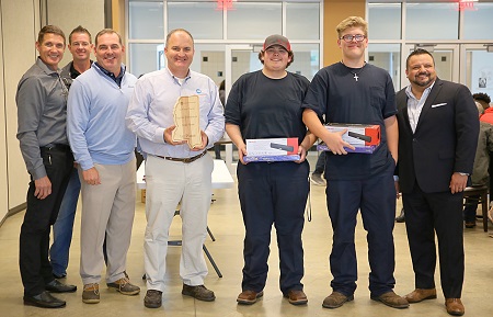 Madison County Career and Technical students Travis Frazier, third from right, and Tyler Birdwell, second from right, took first place in the Toyota Express Maintenance Contest at East Mississippi Community College. They are pictured with, from left, Gulf States Toyota District Service and Parts Manager Colin Jones, EMCC Automotive Technology/Diesel Mechanics Department Head Dale Henry, Carl Hogan Toyota General Manager Jonnie Moore and Gulf States Toyota Workforce Development Manager Robert Trevino.