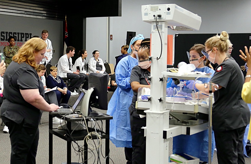 Students in East Mississippi Community College’s Division of Nursing and Allied Health programs participate in a large-scale emergency medical simulation in the Lyceum Auditorium on the college’s Golden Triangle campus in early March, prior to social distancing efforts in the state to slow the spread of the coronavirus. 