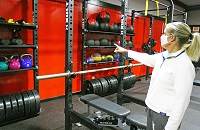 East Mississippi Community College Wellness Director Cathy Castleberry in a new area of the Wellness Center dubbed LionFit, which features equipment used in high-intensity, functional-fitness workouts. LionFit was the result of an addition and expansion of the Wellness Center that was funded by grants from the Blue Cross & Blue Shield of Mississippi Foundation.