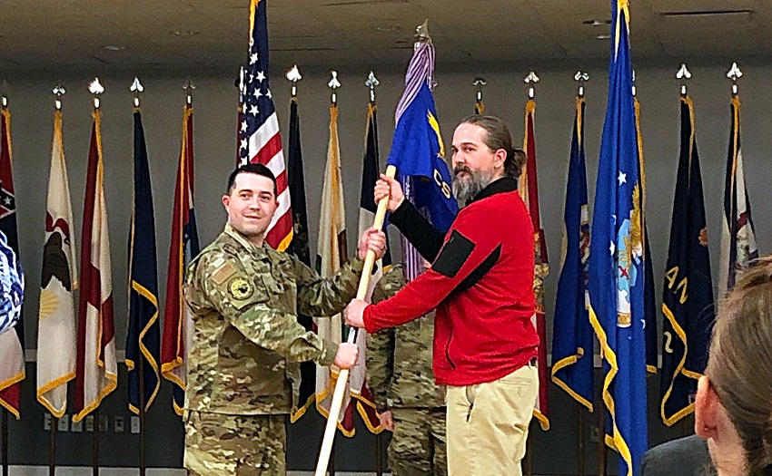 East Mississippi Community College Information Systems Technology Department Director Brandon Sesser, at right, is named an Honorary Commander of the 14th Communications Squadron at Columbus Air Force Base during an induction ceremony. He is pictured here with the commander of the 14th Communications Squadron, 14th Mission Support Group, 14th Flying Training Wing Maj. Brandon Palmer.