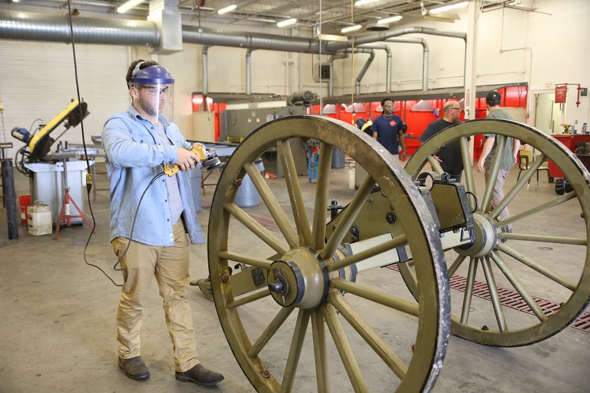 East Mississippi Community College Welding Technology student Dillon Larsen of Columbus works on a cannon carriage last fall. Students in the welding program helped restore the cannon carriage, which is now on display at Mississippi State University.