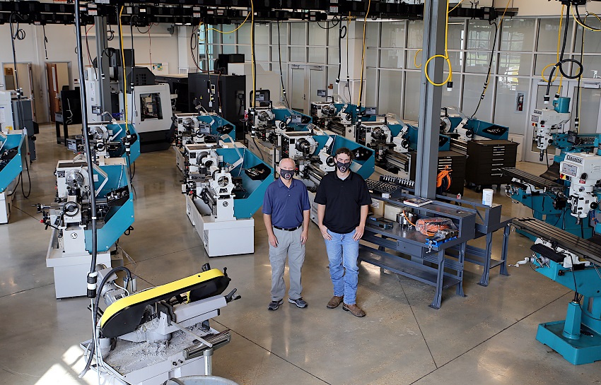 Students enrolled in the Precision Manufacturing & Machining program at The Communiversity are taught on the latest industrial equipment in use today. Instructors Ronnie Guy, at left, and James Pugh are pictured here in the program’s lab.