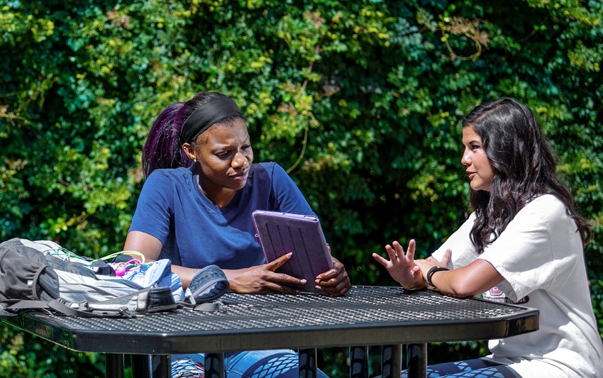 Students on East Mississippi Community College’s Scooba campus chat between classes in this file photo. EMCC will be offering online courses during the Maymester term.