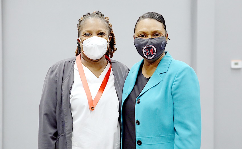 Columbus resident Mia Mullin, at left, earned an Associate Degree Nursing degree at East Mississippi Community College nearly 20 years after completing her Practical Nursing studies at the college. She is pictured here with EMCC Director of Nursing Programs/Associate Dean of Health Sciences Dr. Tonsha Emerson, who was Mullin’s Practical Nursing instructor in 2001.