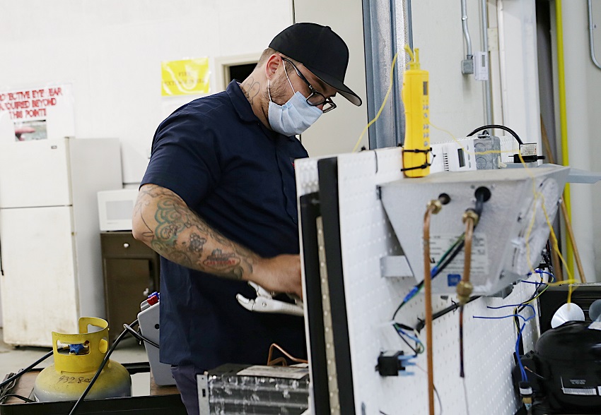 A student in East Mississippi Community College’s HVAC program works on a lab assignment. HVAC is among several short-term training programs available to area residents who qualify through the Skills2Work program.