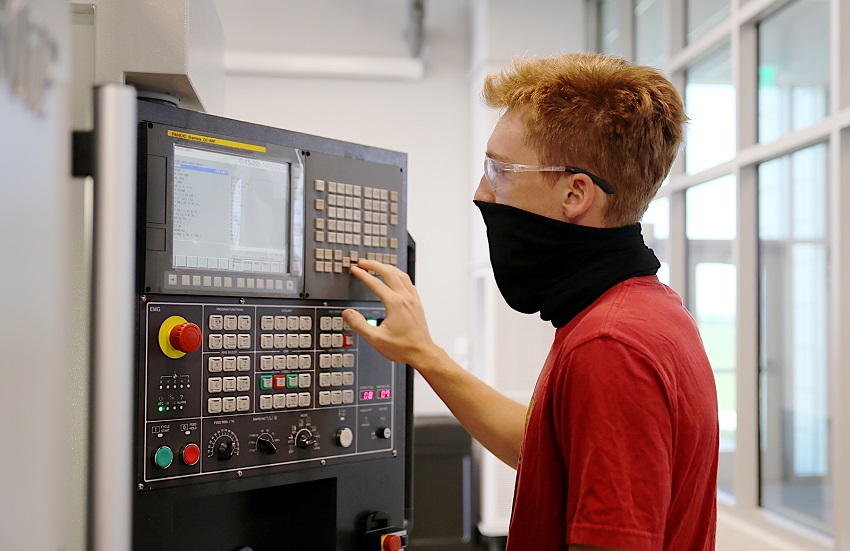 A student programs one of the machines in the Precision Machining & Manufacturing lab at The Communiversity in this 2020 file photo. The program is among many offered through East Mississippi Community College’s Workforce and Community Services division. 