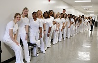Twenty-eight graduates of East Mississippi Community College’s Associate Degree Nursing program participated in a pinning ceremony Thursday, Dec. 9, in the Lyceum Auditorium on the college’s Golden Triangle campus.