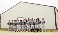Members of the East Mississippi Community College baseball team outside the building that will house the players’ lockers, a dressing room and meeting area. A fundraiser has begun to equip the building’s interior. 