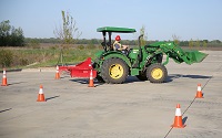 East Mississippi Community College Heavy Civil Construction student Allison Adair practices backing a tractor during class. Adair and three other students will be among the competitors during a heavy equipment operator “roadeo” competition that will take place at The Communiversity on April 21. 