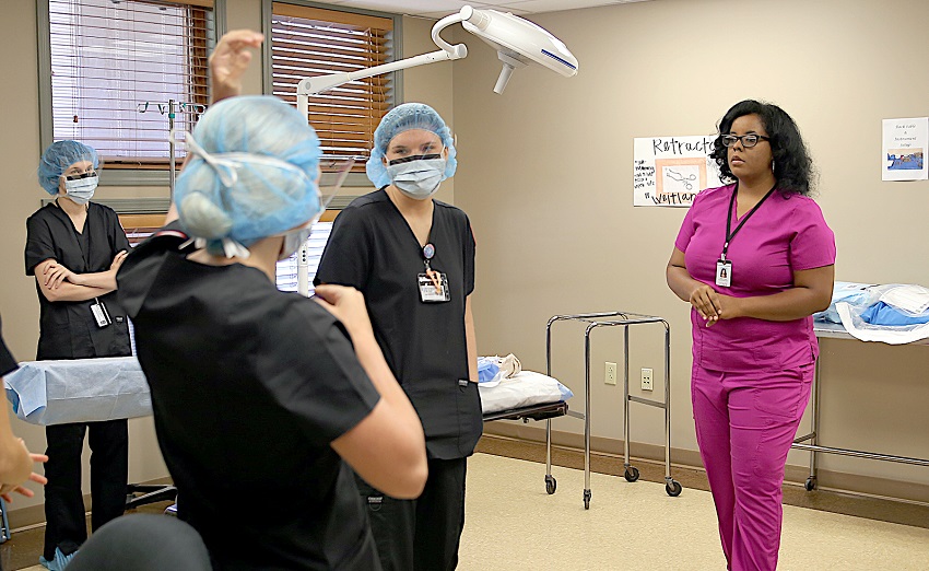 Janan Rush, at right, who passed away in September of 2020, speaks with students in East Mississippi Community College’s Surgical Technology program during a September 2019 class. Rush was the director and an instructor for the program. 