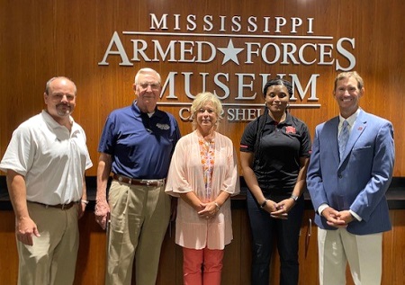 While researching museums, EMCC administrators were given a tour of the Mississippi Armed Forces Museum at Camp Shelby by Maj. Gen. Richard Poole (retired), second from left. EMCC officials who toured the museum are, from left, former Executive Director of College Advancement and Athletics Marcus Wood, Director of Alumni Affairs and Foundation Operations Gina Cotton, Athletic Director Sharon Thompson and EMCC President Dr. Scott Alsobrooks.
