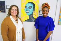 East Mississippi Community College art instructor Lisa Spinks, at left, and Brejenn Allen, a graduate of the college, during the college’s Pine Grove Arts Festival last year. The festival returns this year April 19-21.