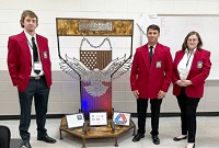 From left, East Mississippi Community College students Tony Brooks, Nathan White and Haley Hutchinson with their winning entry in the Chapter Display category during the Mississippi SkillsUSA State Championships in Jackson. The Welding & Fabrication students on EMCC’s Scooba campus earned first place and advance to the national SkillsUSA championships.