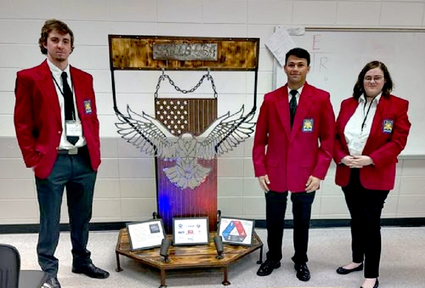 From left, East Mississippi Community College students Tony Brooks, Nathan White and Haley Hutchinson with their winning entry in the Chapter Display category during the Mississippi SkillsUSA State Championships in Jackson. The Welding & Fabrication students on EMCC’s Scooba campus earned first place and advance to the national SkillsUSA championships.