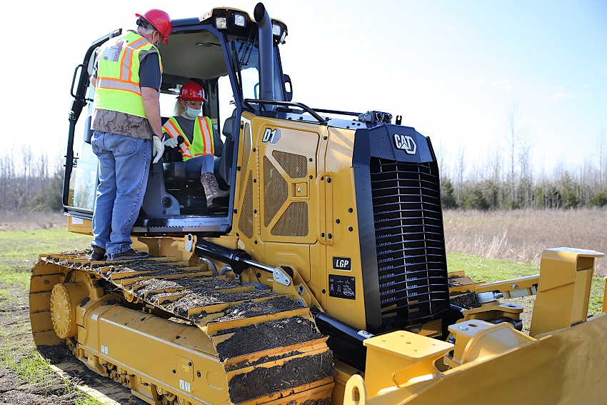 East Mississippi Community College Heavy Civil Construction instructor Carlton Ray Hollis, Sr., at left, gives student Tammy Warren pointers on the operation of a dozer used in the program in this file photo from February 2021. EMCC’s Workforce and Community Services division offers a wide range of programs designed to help put people to work.