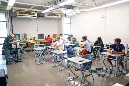 East Mississippi Community College Humanities instructor Derrick Conner, at left, leads a class on the college’s Scooba campus. This year, EMCC experienced the second largest percentage increase in fall enrollment among the state’s 15 public community colleges.