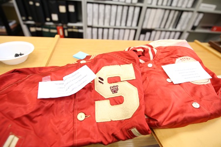 Sports memorabilia like these 1947-48 letterman jackets will be among the items on display in Wallace Hall once it is converted into a museum. 