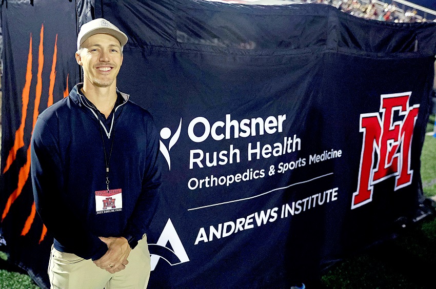 Dr. Lane Rush, orthopedic surgeon at Ochsner Rush Health, is the head team physician for EMCC. Ochsner Rush Health is the sports medicine services provider for the college. Rush is pictured here at an EMCC home football game. 