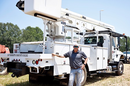 Bill Buckner, pictured here, was hired to serve as the instructor for the new Utility Lineworker Technology program on East Mississippi Community College’s Golden Triangle campus. EMCC was awarded an AccelerateMS grant of more than $473,000 for the program, which was used to purchase training equipment, including the bucket truck pictured here.
