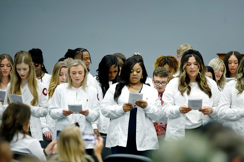 Students enrolled in the Associate Degree Nursing program on East Mississippi Community College’s Golden Triangle campus recite the Nursing Oath during a White Coat Ceremony that took place Aug. 31, 2023.