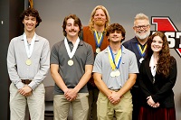 Phi Theta Kappa Honor Society advisors for EMCC’s Beta Iota Zeta chapter on the college’s Golden Triangle campus Dr. Brian Tesch, back row at left, and Scott Baine, back row at are pictured during a Oct. 28 member induction ceremony with the chapter’s new student officers, who are Linden Stelioes-Wills, president, Brayden Shields, vice president of leadership; James