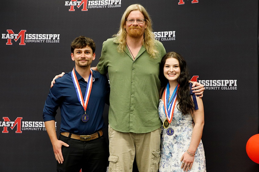 Members of the Phi Theta Kappa All-Mississippi Academic Team on East Mississippi Community College’s Golden Triangle campus are Linden Stelioes-Wills, left, and Emma Morgan, right. They are pictured here with Golden Triangle campus PTK advisor Dr. Brian Tesch.