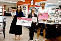 Sodexo Area Marketing Manager Elizabeth Brunet, at left, presented LOVE’s Kitchen Executive Director Fannie Johnson, center, with a ceremonial check for the $1,250, and East Mississippi Community College freshman Matthew Wolvers, right, with a $575 Visa gift card. Wolvers was a winner in Sodexo’s national “Slay the Day Sweepstakes” and designated LOVE’s Kitchen to receive the donation from Sodexo. 
