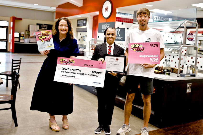Sodexo Area Marketing Manager Elizabeth Brunet, at left, presented LOVE’s Kitchen Executive Director Fannie Johnson, center, with a ceremonial check for the $1,250, and East Mississippi Community College freshman Matthew Wolvers, right, with a $575 Visa gift card. Wolvers was a winner in Sodexo’s national “Slay the Day Sweepstakes” and designated LOVE’s Kitchen to receive the donation from Sodexo. 